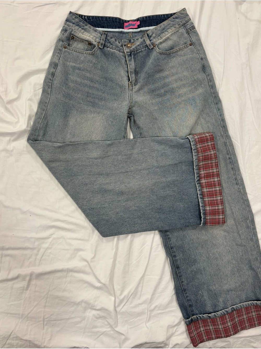 Edikted Light Wash Flare Jeans with Red Plaid Cuffs
